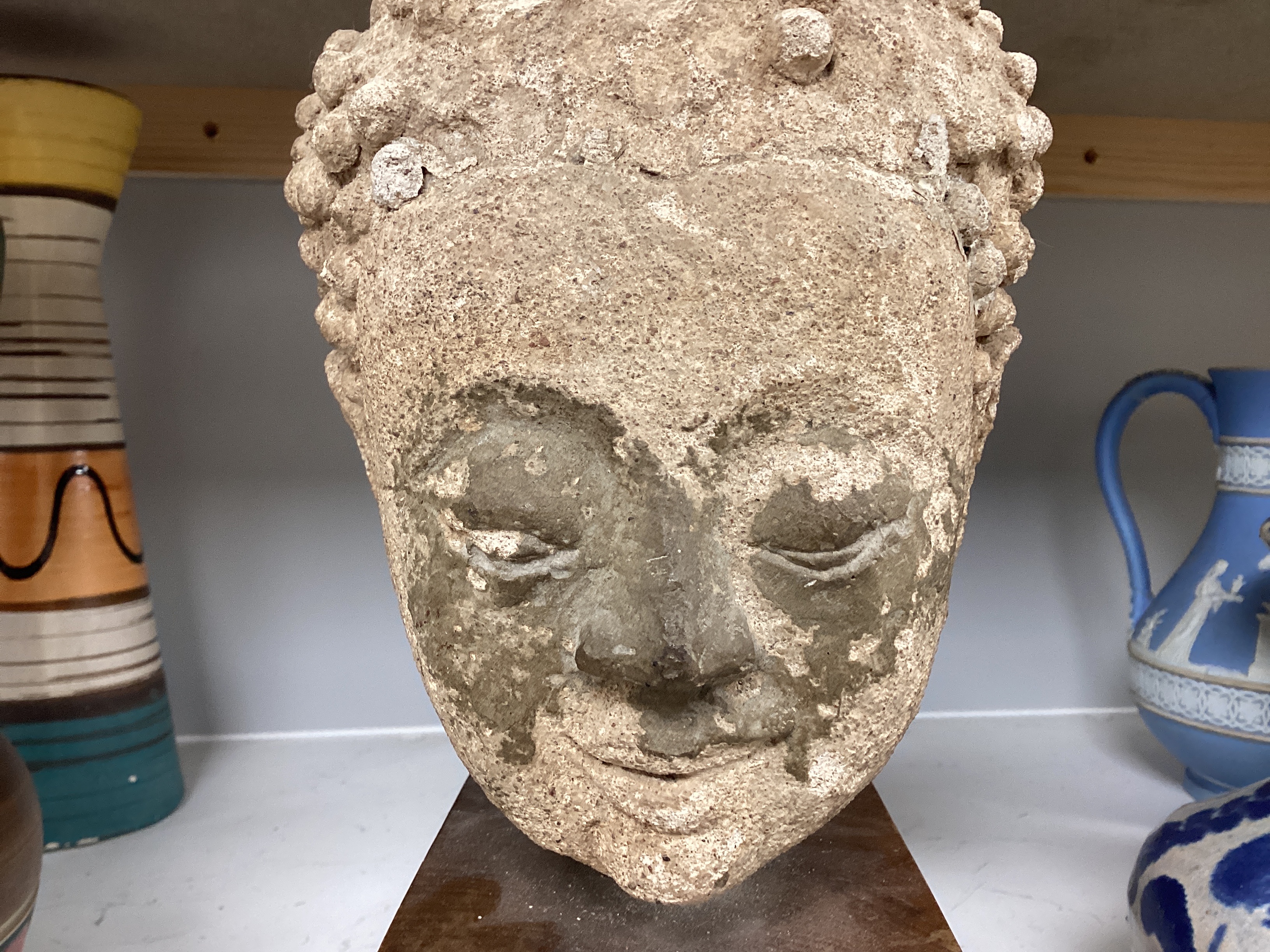 A South East Asian limestone head of Buddha, 29cm